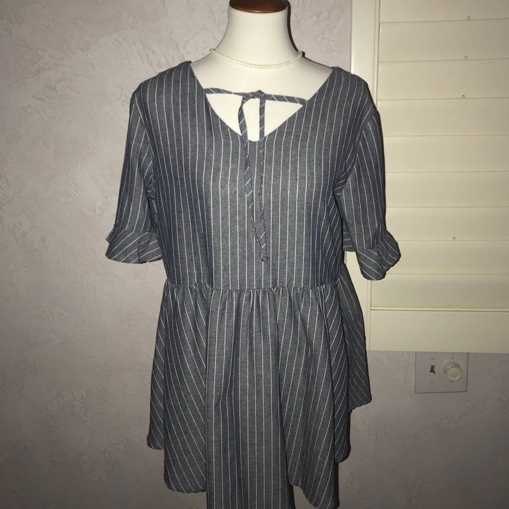 Chambray and white striped peplum top. Trendy!